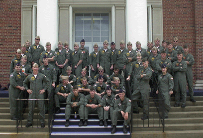 Adam is in the middle wearing sunglasses. Adam was the only one in this group to continue on to flight school to become a pilot.